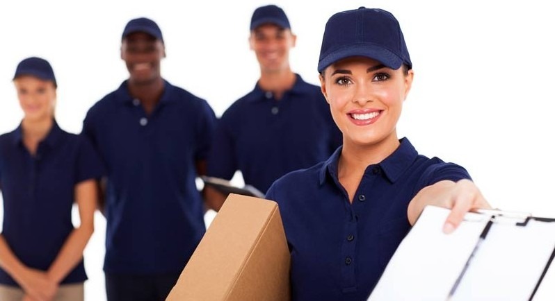 A team of four shipping experts delivering parcels