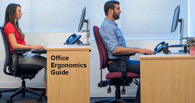 Two people sitting at desks looking at laptops