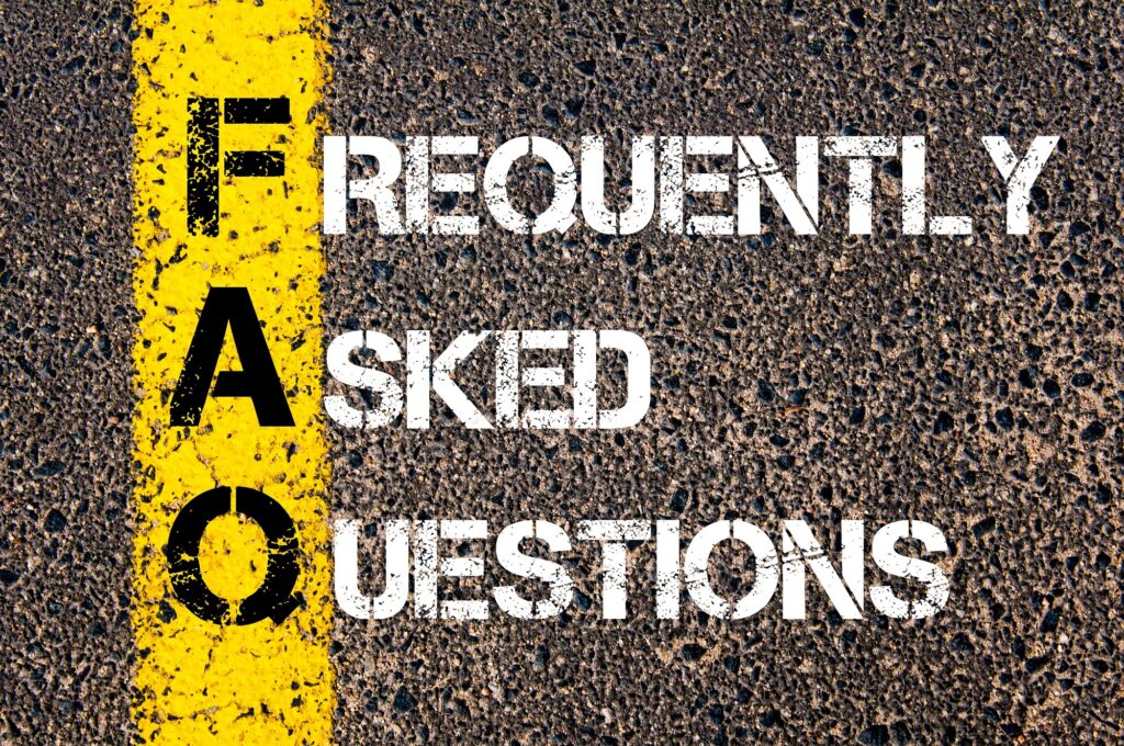 Yellow paint line on the road over asphalt stone background with FAQ written over it.