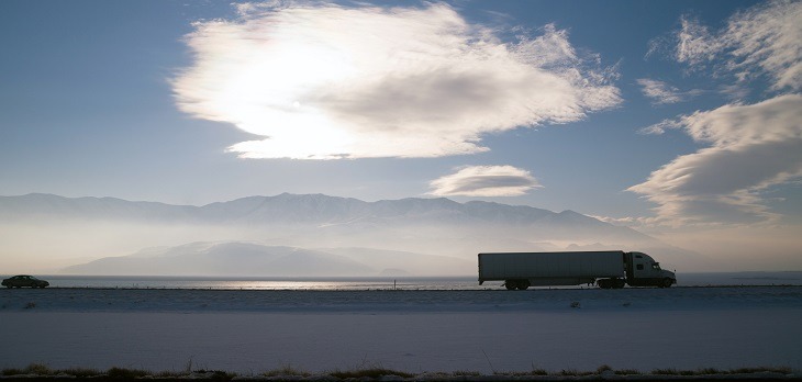 Long Haul Over the Road Freight Trucking Winter Highway