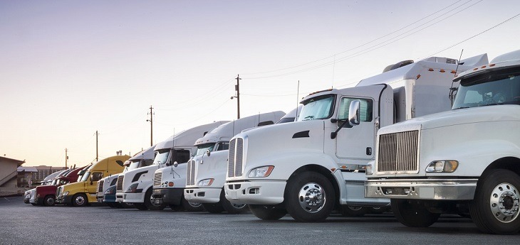 Freight trucks lined up one next to another