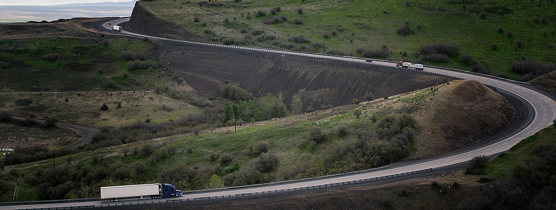 Trucks moving on a winding road