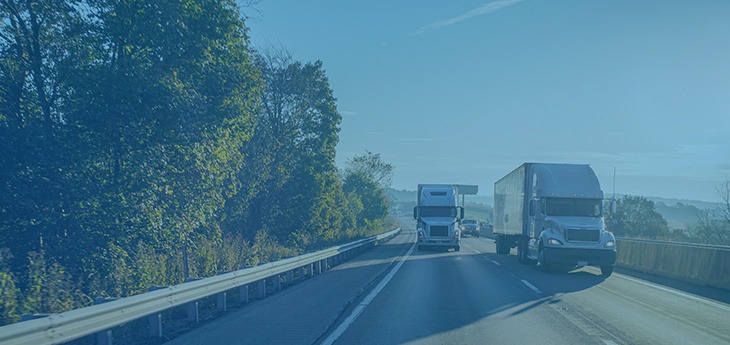 Trucks hauling freight by road