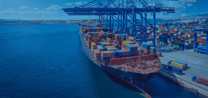 A container ship docket at a a port.