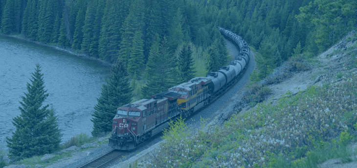 A freight train moving through a Canadian landscape