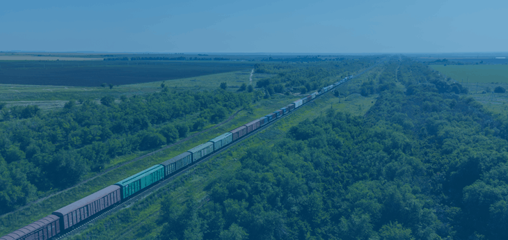 A freight train moving through a countryside